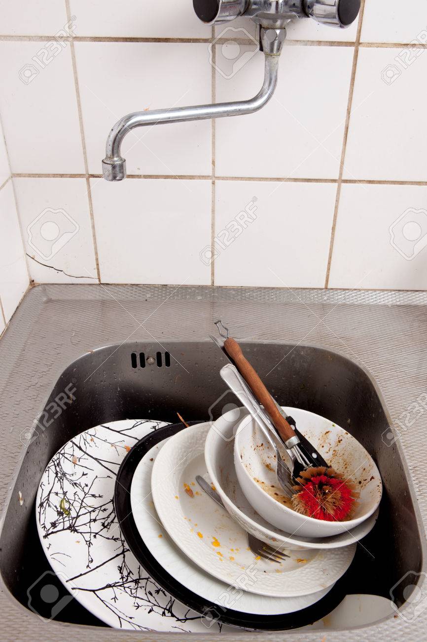 Kitchen Sink With Dishes dirty dishes in kitchen sink stock photo, picture and royalty free Kitchen Sink With Dishes dirty dishes in kitchen sink stock photo, picture and royalty free