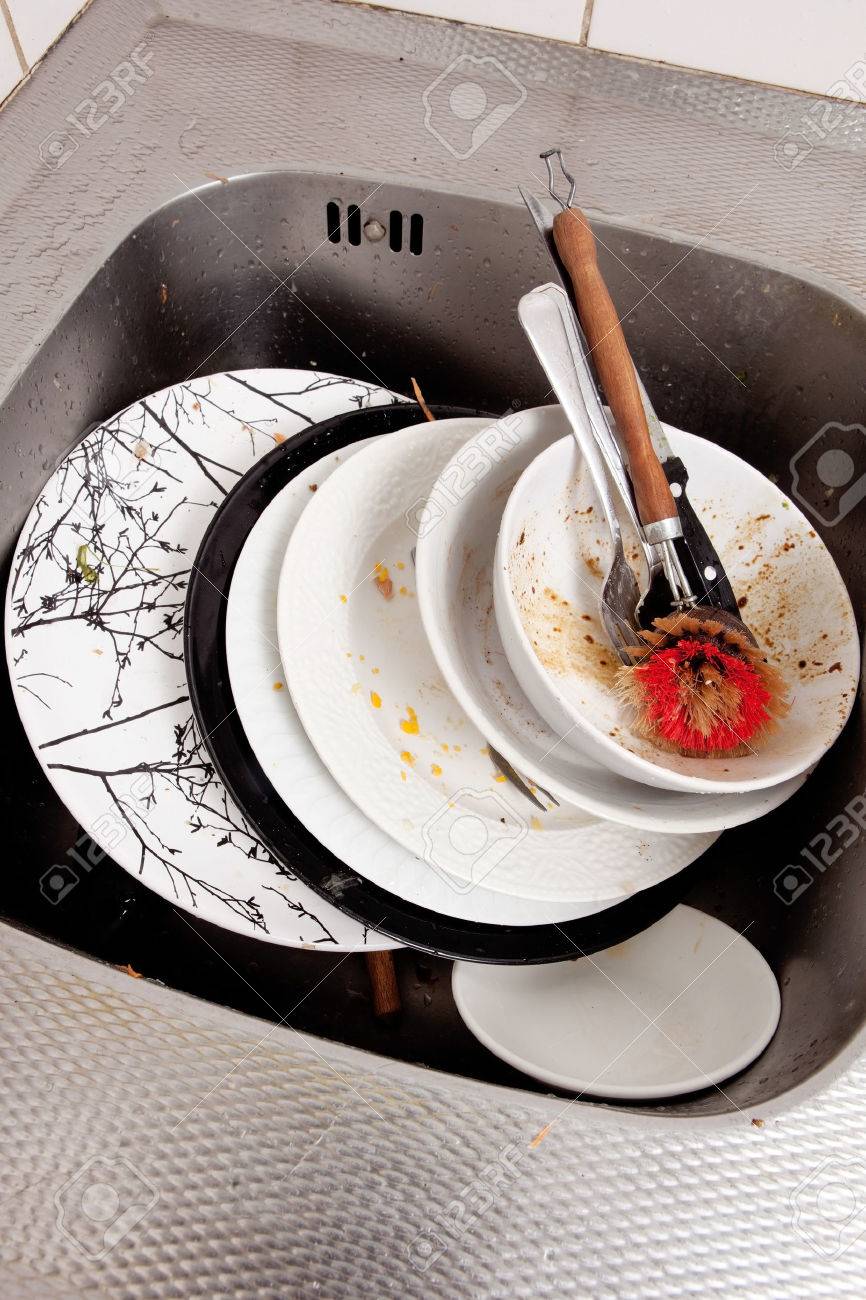 Kitchen Sink With Dishes dirty dishes in kitchen sink stock photo, picture and royalty free Kitchen Sink With Dishes dirty dishes in kitchen sink stock photo, picture and royalty free