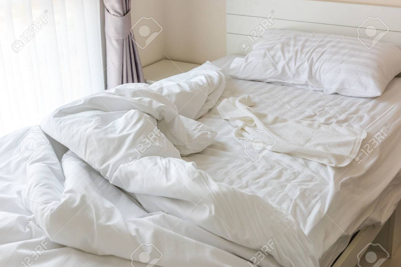 messy bedding sheets and pillow stock photo picture and royalty