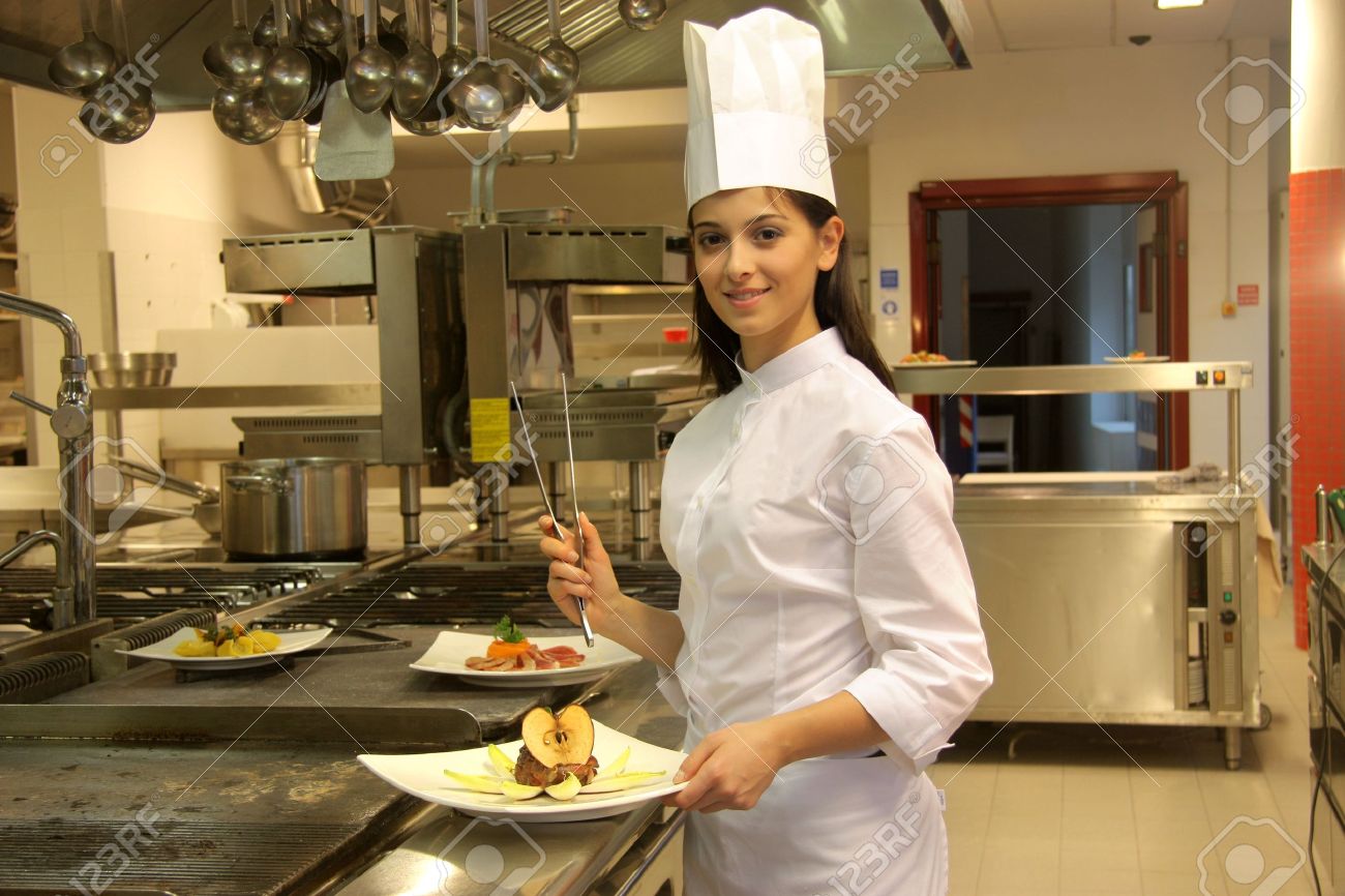 cook in a kitchen of a restaurant stock photo picture and royalty