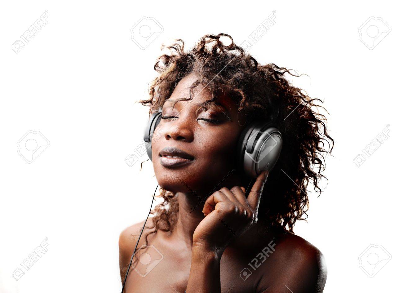 Beautiful Black Woman Listening To Music Stock Photo, Picture and Royalty  Free Image. Image 7955592., image size:1300x945