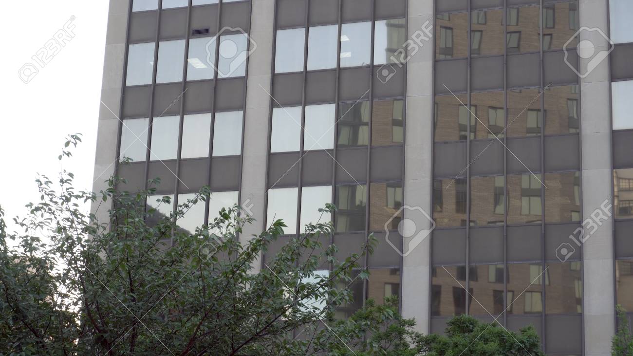 Exterior Establishing Shot Of A New York City Style Glass Office Stock Photo Picture And Royalty Free Image Image 93892127 https www 123rf com photo 93892127 exterior establishing shot of a new york city style glass office building day time dx photo html
