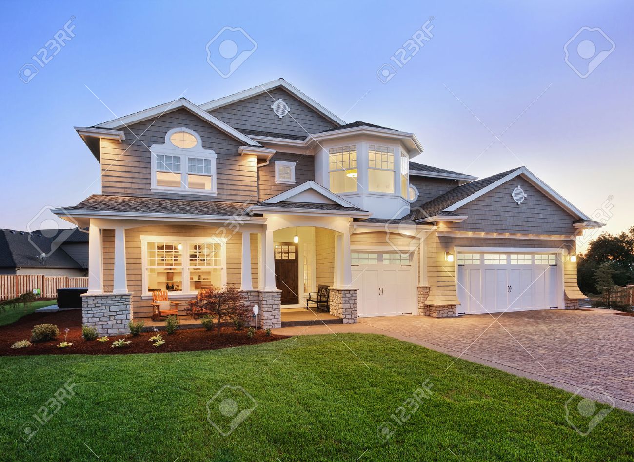 Modern House Exterior At Twilight. Luxury Villa With Garage. Stock Photo,  Picture and Royalty Free Image. Image 203466824.