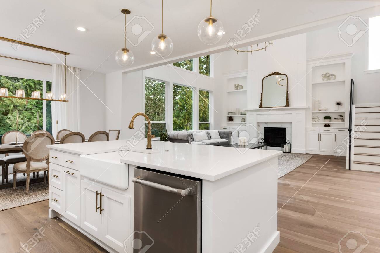 white kitchen cabinets wood floors beautiful white kitchen and living room in new luxury home with white kitchen cabinets wood floors beautiful white kitchen and living room in new luxury home with