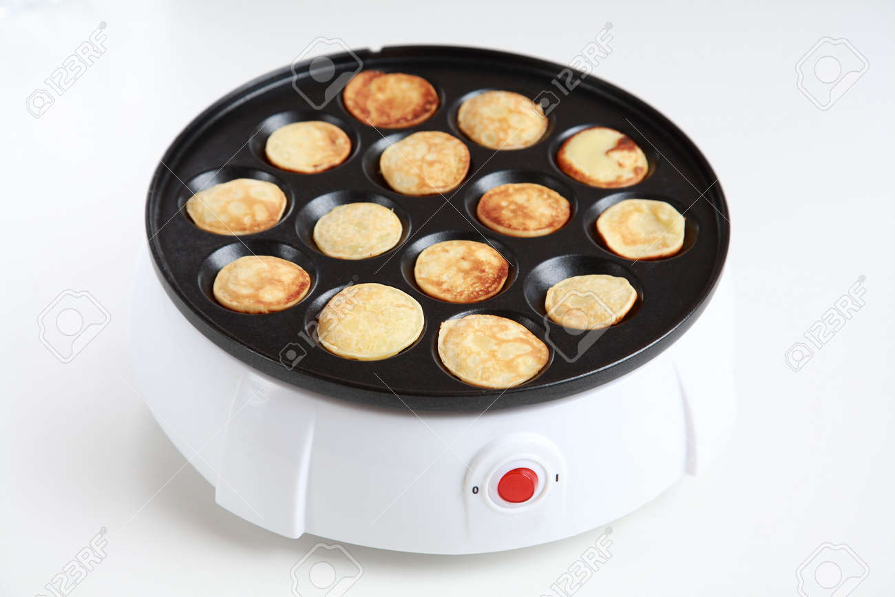 Pancake Maker For Mini Pancakes On White Background Stock Photo Pancake Maker For Mini Pancakes On White Background Stock Photo 5862124