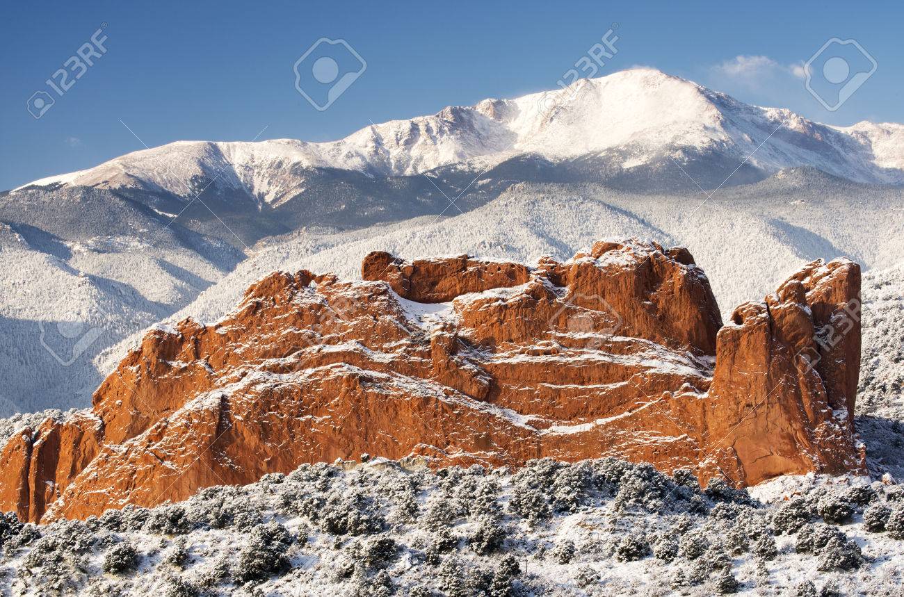 A fresh winter snow covers Pike\u0027s Peak and The Garden of the..