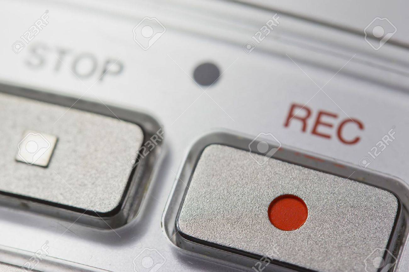 Macro view of a button on the Recording on a digital voice recorder - 15133305 Macro view of a button on the Recording on a digital voice recorder - 15133305