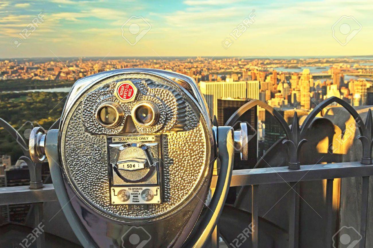 Coin operated binoculars in sunset light Top of the Rock, New York City - 19223638 Coin operated binoculars in sunset light Top of the Rock, New York City - 19223638
