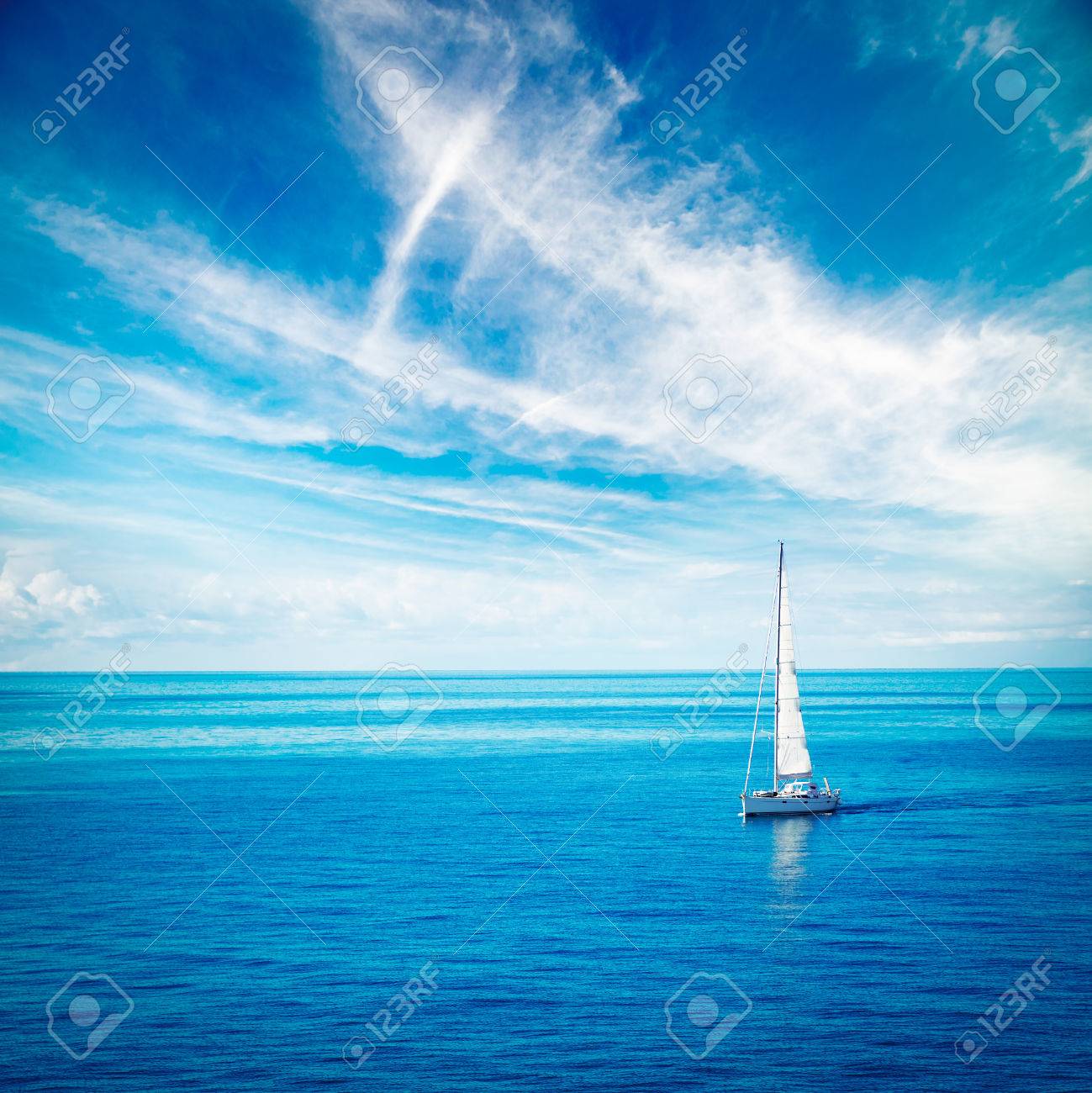 Beautiful Seascape with White Yacht Sailing in Blue Sea. Square Photo with Copy Space. - 49168382 Beautiful Seascape with White Yacht Sailing in Blue Sea. Square Photo with Copy Space. - 49168382