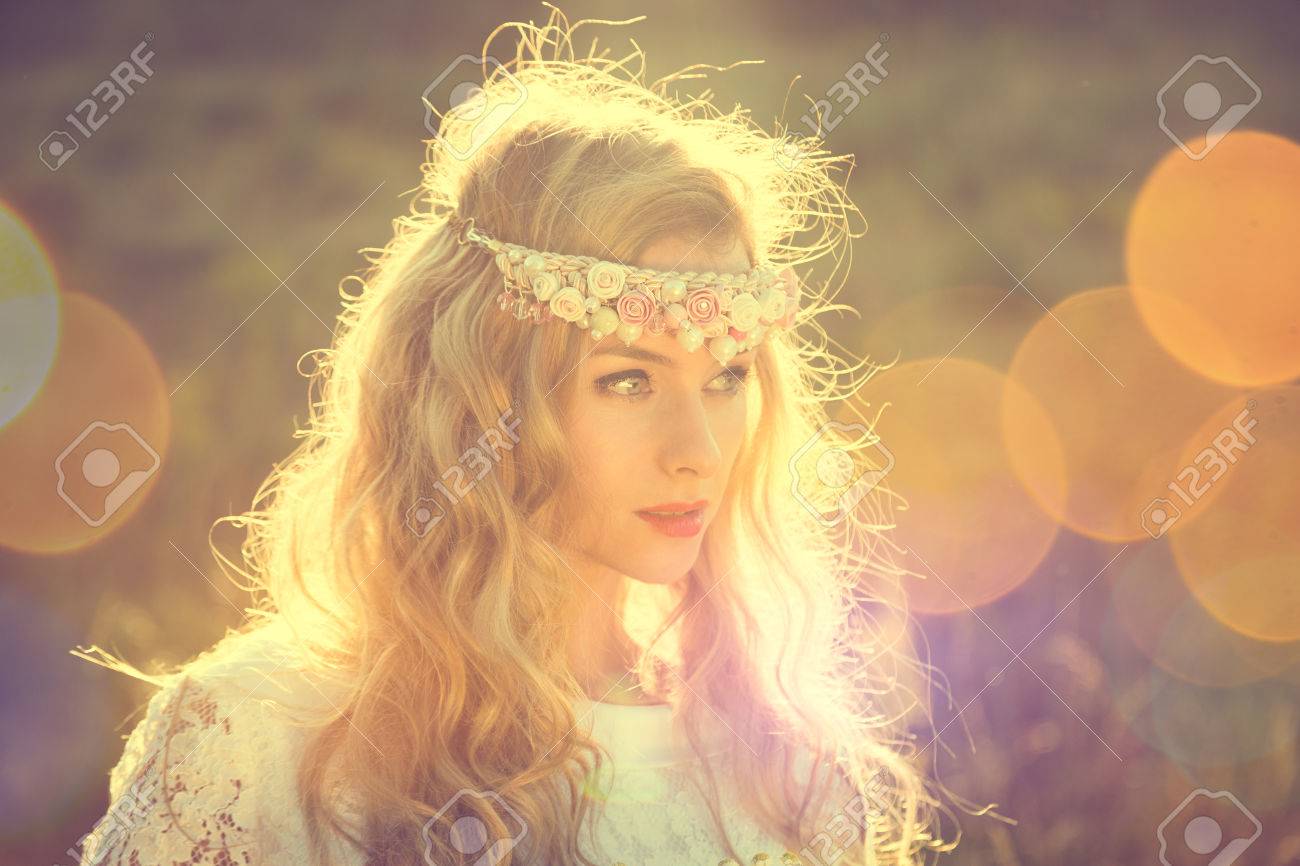 Enchanting Bride with Tiara on Nature Background. Modern Bridal Style. Boho Fashion Wedding. Filtered Cross Processed Photo with Bokeh and Copy Space. - 49543551 Enchanting Bride with Tiara on Nature Background. Modern Bridal Style. Boho Fashion Wedding. Filtered Cross Processed Photo with Bokeh and Copy Space. - 49543551
