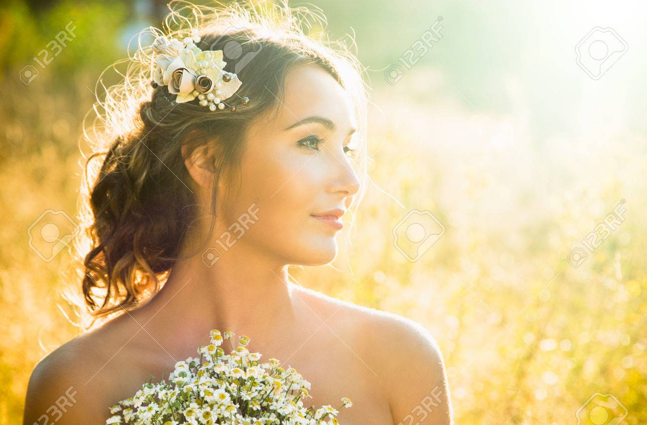 Innocent Young Girl Outdoors at Nature Background. Fashion Wedding Hairstyle and Accessories. Beautiful Woman Portrait. Candid Bride Photo. Sunset Backlit Light. Toned Photo with Copy Space. - 68628750 Innocent Young Girl Outdoors at Nature Background. Fashion Wedding Hairstyle and Accessories. Beautiful Woman Portrait. Candid Bride Photo. Sunset Backlit Light. Toned Photo with Copy Space. - 68628750
