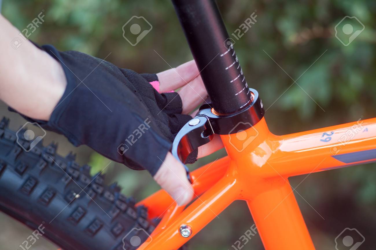 hands on bike seat