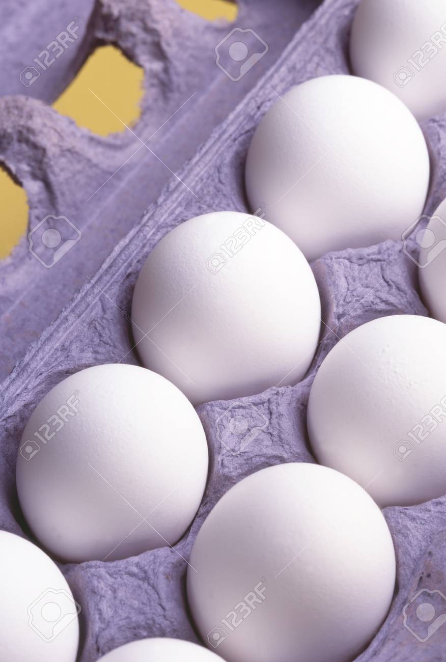 Download Dozen Eggs In A Blue Carton On A Yellow Background Stock Photo Picture And Royalty Free Image Image 11753141 Yellowimages Mockups