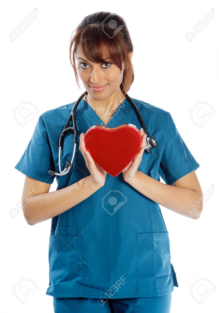 Attractive Indian doctor woman posing in a studio in front of a background - 22288191 Attractive Indian doctor woman posing in a studio in front of a background - 22288191
