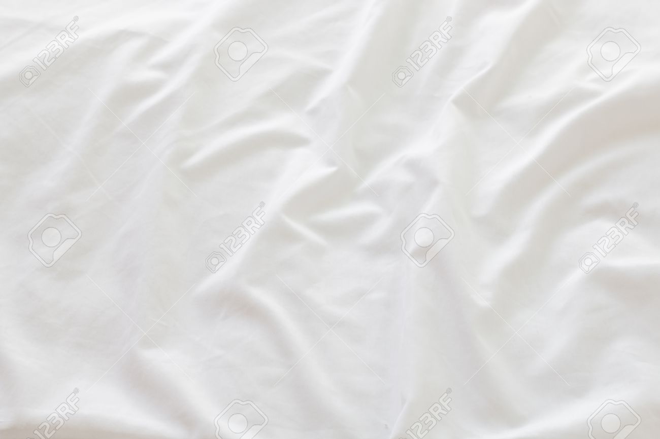 creased white cloth material