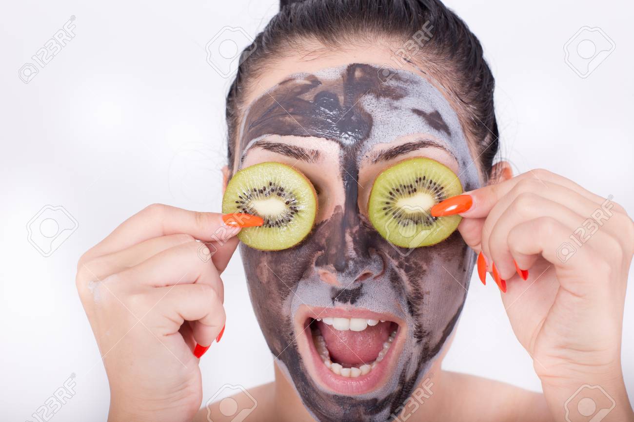 Download Pretty Young Woman With Facial Mask Making Silly Face With Kiwi Stock Photo Picture And Royalty Free Image Image 61492785 PSD Mockup Templates