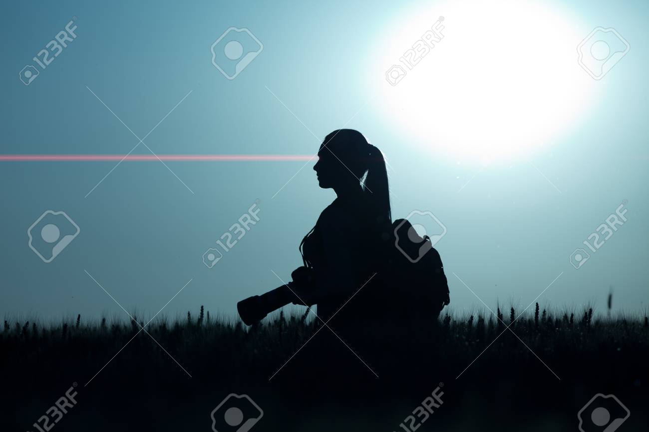 Silhouette Of Young Girl Taking Nature Photos In Wheat Field At Night Stock  Photo, Picture and Royalty Free Image. Image 63065247., image size:1300x866