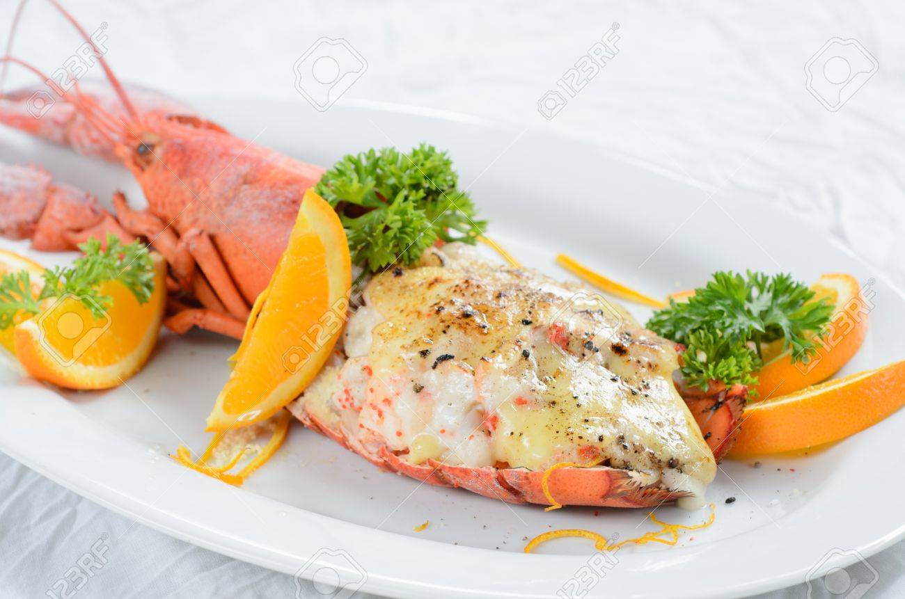 Cheese Baked Lobster In White Plate Stock Photo Picture And Royalty Free Image Image 20978627