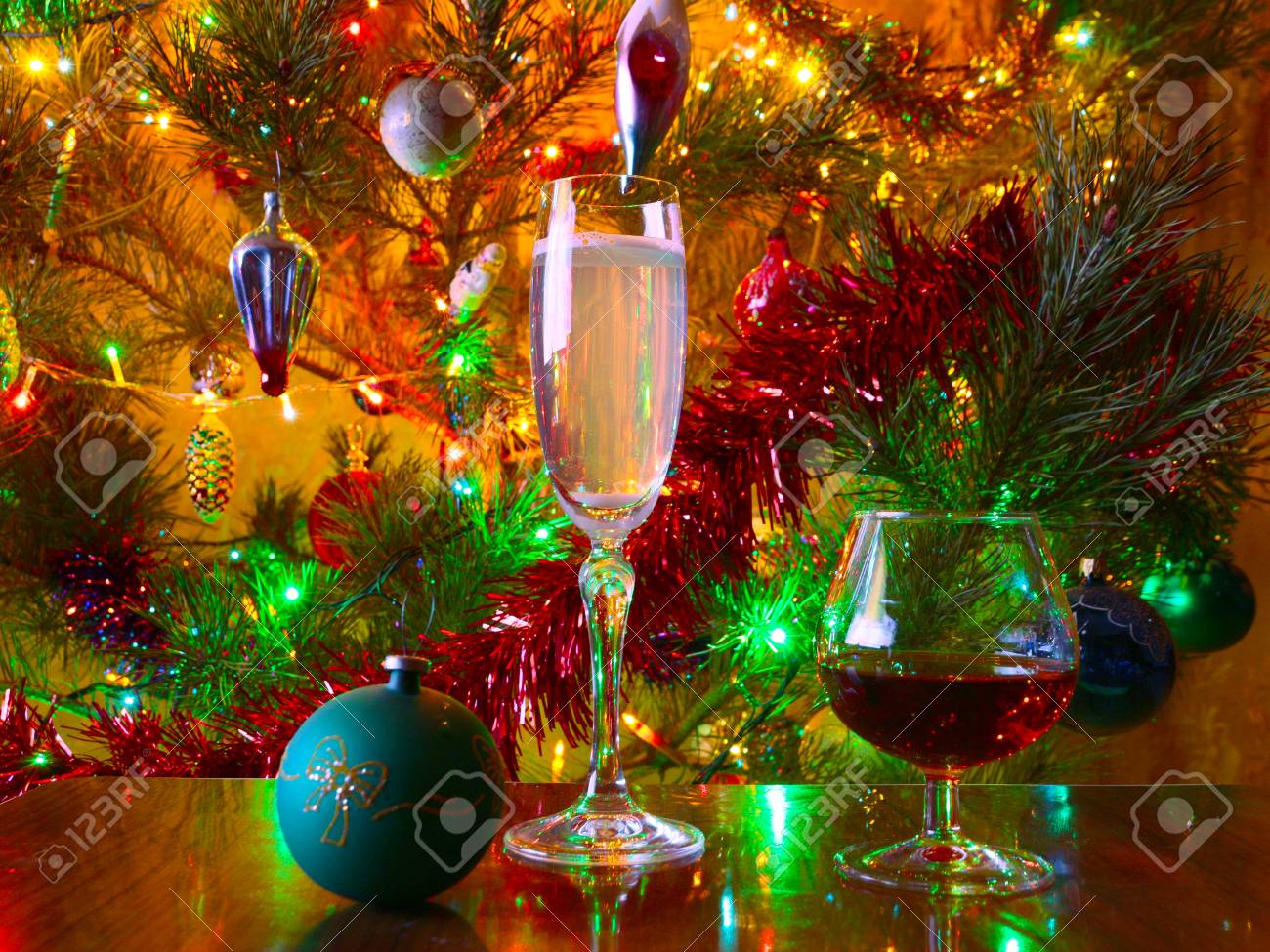 glasses of wine and strong liquor on a background of brightly