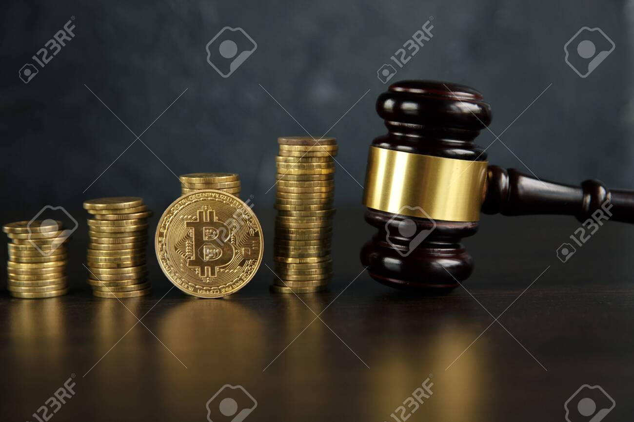 Auction Gavel And Bitcoin Cryptocurrency Money On A Wooden Desk, Close-up.  Law Gavel And Golden Bitcoin Symbol On White Background With Stock Photo,  Picture and Royalty Free Image. Image 127650052.