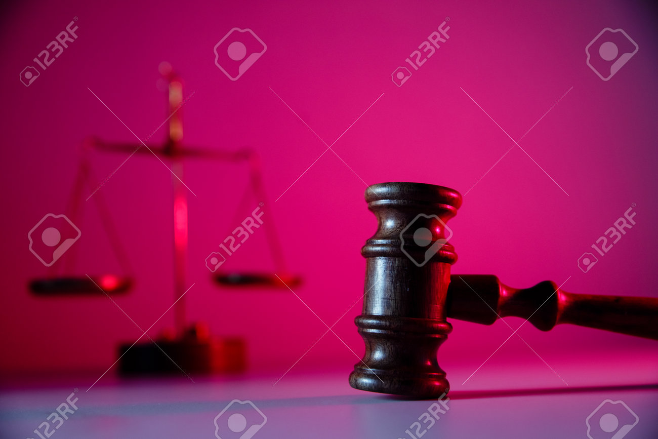 Scales of justice and wooden gavel in courtroom. Law concept - 169819159 Scales of justice and wooden gavel in courtroom. Law concept - 169819159