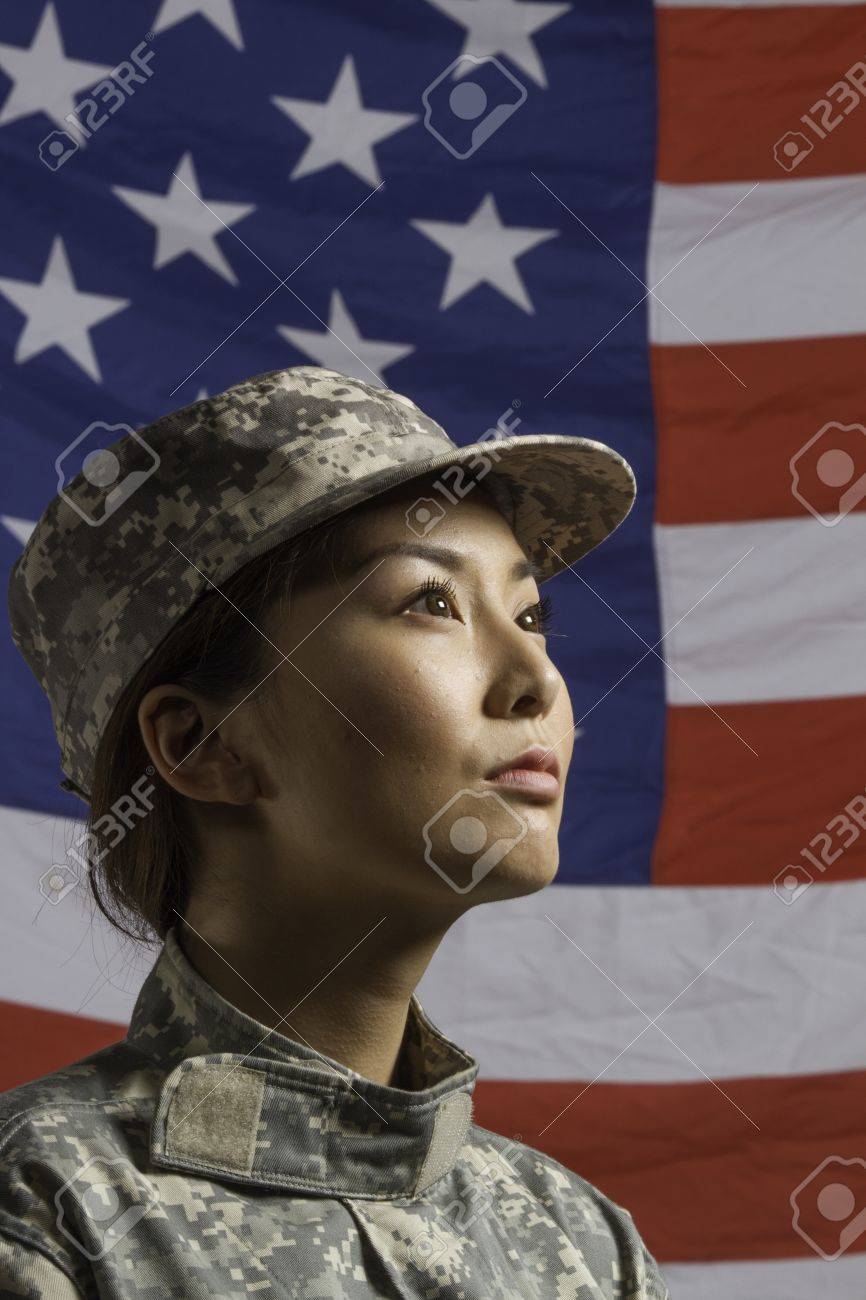 Asian-American Military Woman Pictured In Front Of US Flag, Vertical Stock  Photo, Picture And Royalty Free Image. Image 22384417.