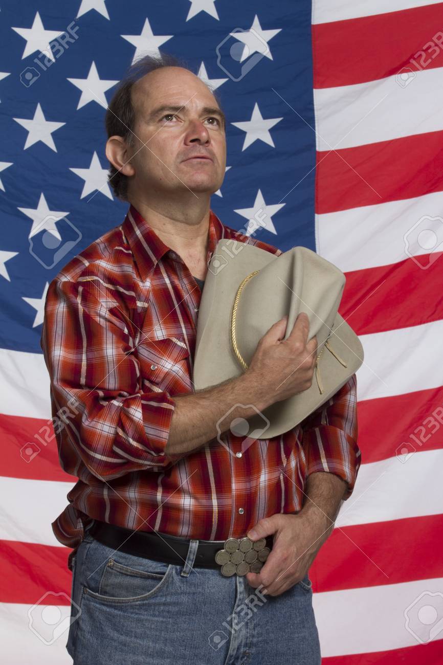 Patriotic Man Looking Up In Front Of American Flag, Vertical Stock Photo,  Picture And Royalty Free Image. Image 22664918.