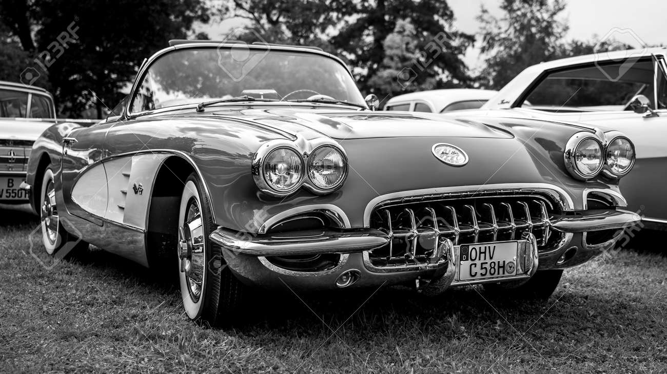 DIEDERSDORF, GERMANY - AUGUST 30, 2020: The sports car Chevrolet Corvette (C1), 1958. Black and white. The exhibition of "US Car Classics". - 155081684 DIEDERSDORF, GERMANY - AUGUST 30, 2020: The sports car Chevrolet Corvette (C1), 1958. Black and white. The exhibition of "US Car Classics". - 155081684