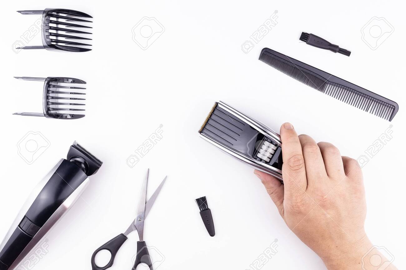 Machine For Haircuts On The Table Are Scissors And A Comb Barbershop