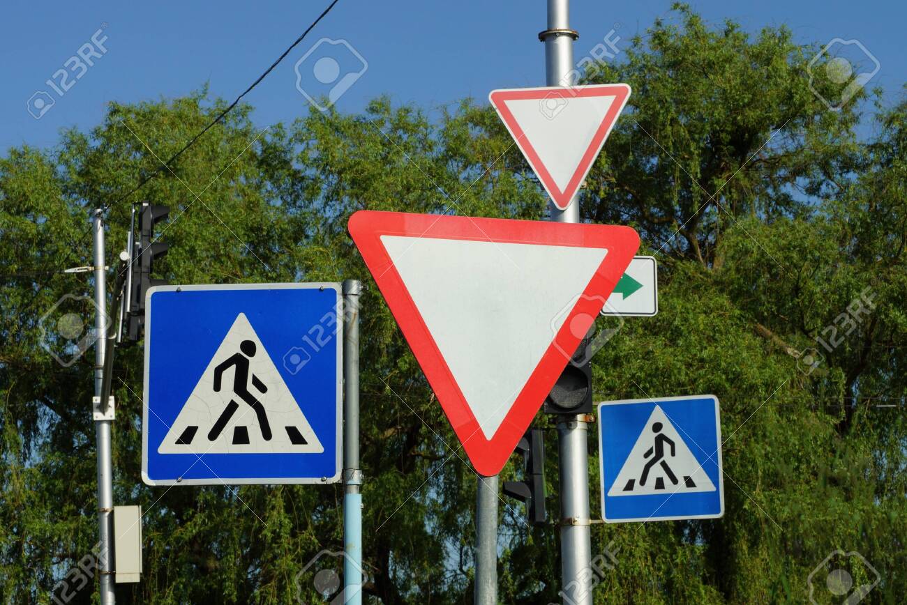 Four Road Signs Pedestrian Crossing And Give Way On The Street Stock Photo Picture And Royalty Free Image Image Four Road Signs Pedestrian Crossing And Give Way On The Street Stock Photo Picture And Royalty Free Image Image