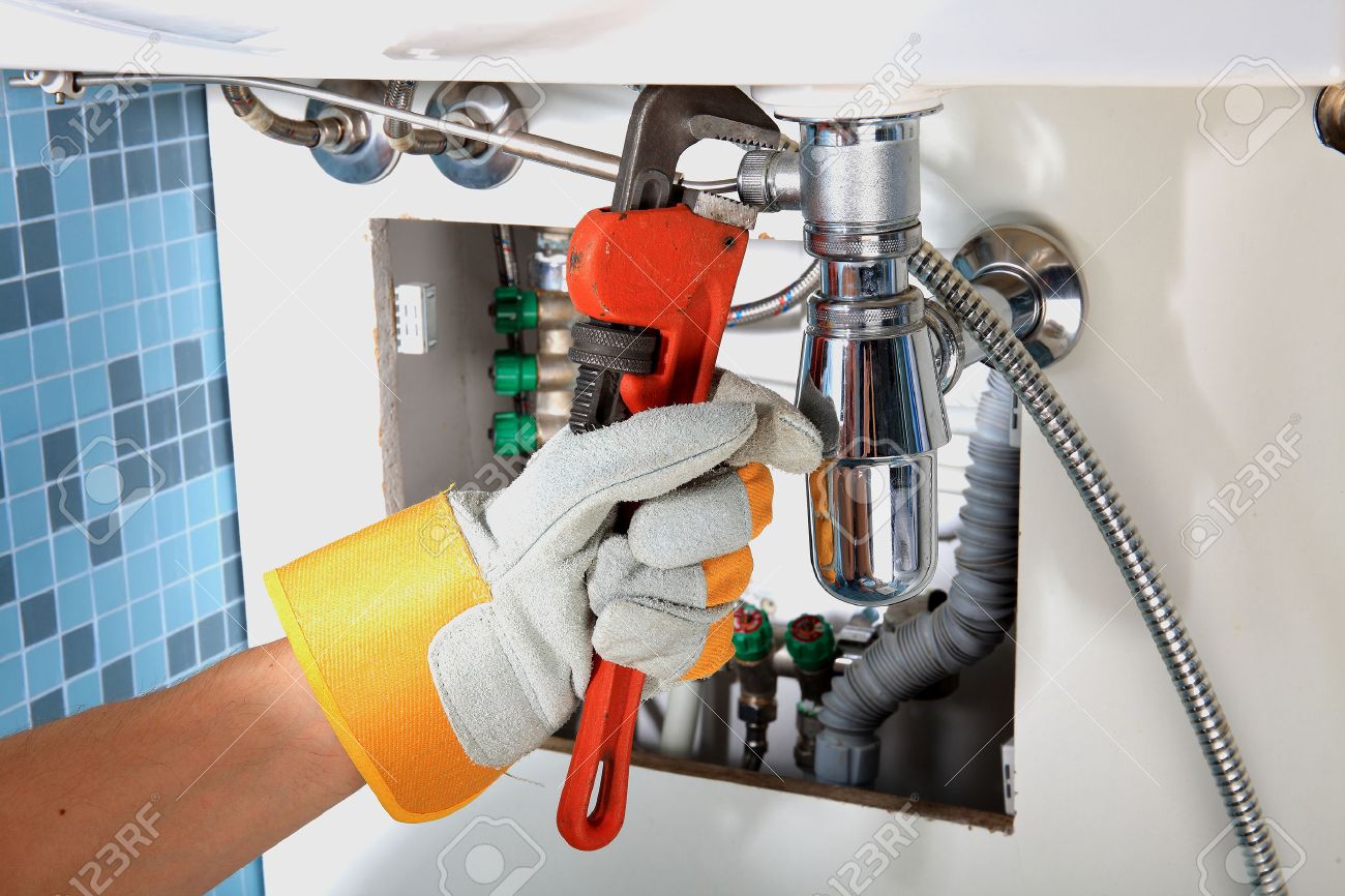 plumbing work and sanitary engineering repairing a pipe under sanitary works
