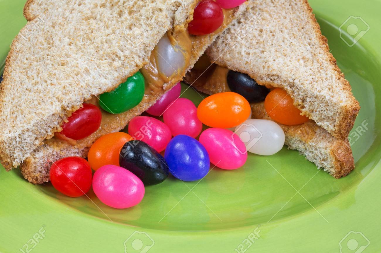 A Close View Of A Peanut Butter And Jelly Bean Sandwich On A