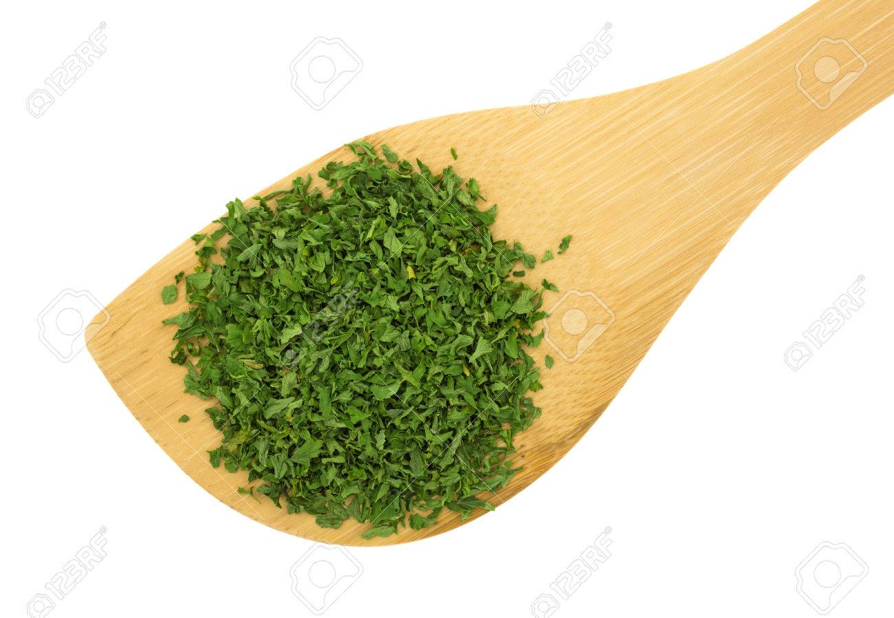 Top View Of A Wood Spoon With Dried Chopped Parsley Flakes Atop Stock Photo Picture And Royalty Free Image Image