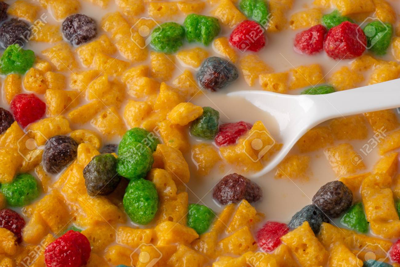 close view of generic fruit flavored breakfast cereal with milk