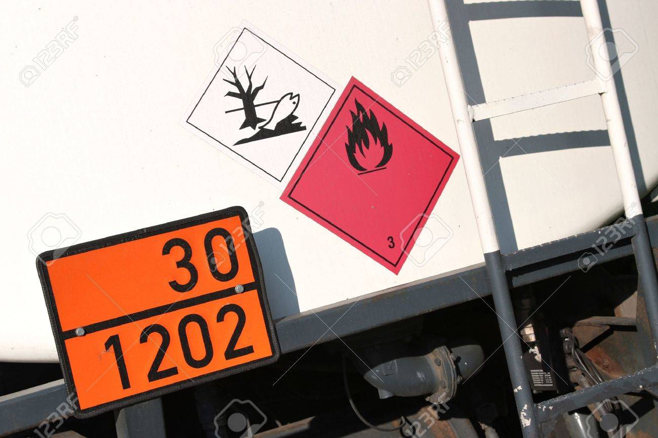 orange-colored plate with hazard-identification number 30 and UN-Number 1202 - 51782895 orange-colored plate with hazard-identification number 30 and UN-Number 1202 - 51782895