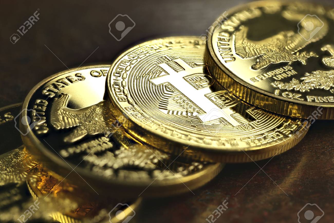 Bitcoin In A Row Of 1 Ounce American Gold Eagle Bullion Coins
