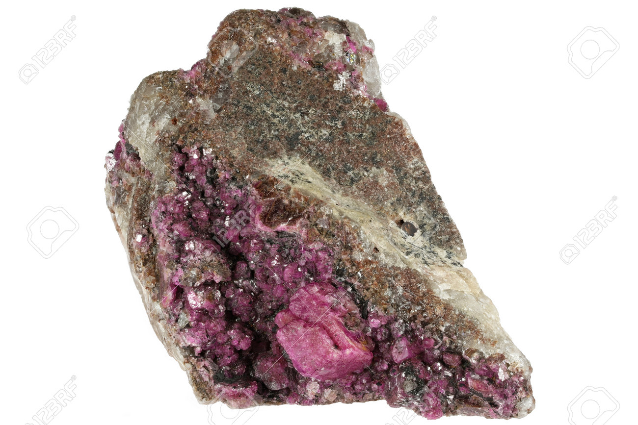 cobalto calcite on matrix from Tantara Mine, DR Congo isolated on white background - 170982662 cobalto calcite on matrix from Tantara Mine, DR Congo isolated on white background - 170982662