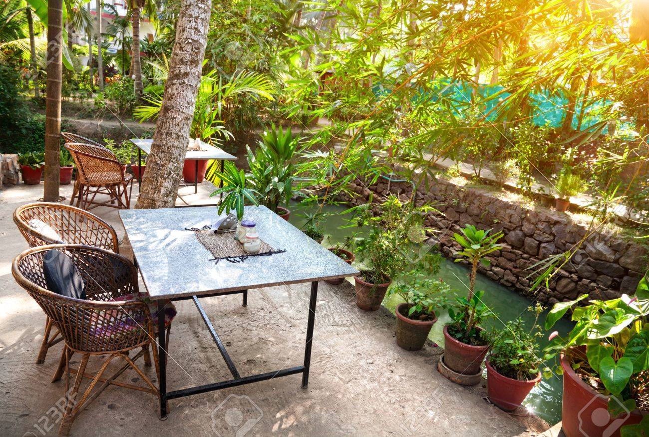 Ayurvedic Restaurant Near The Pond At Sunset In Tropical Garden Kovalam Kerala India Stock Photo Picture And Royalty Free Image Image Source From 123rf.com Image Size Width 875 x Height 1300 Ayurvedic Restaurant Near The Pond At Sunset In Tropical Garden Kovalam Kerala India Stock Photo Picture And Royalty Free Image Image - Near Restaurant Kerala