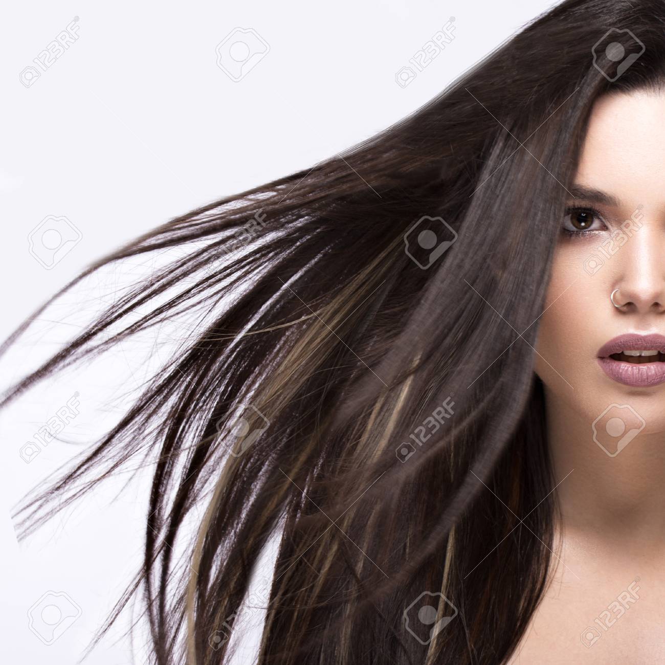 Beautiful Brunette Girl In Move With A Perfectly Smooth Hair