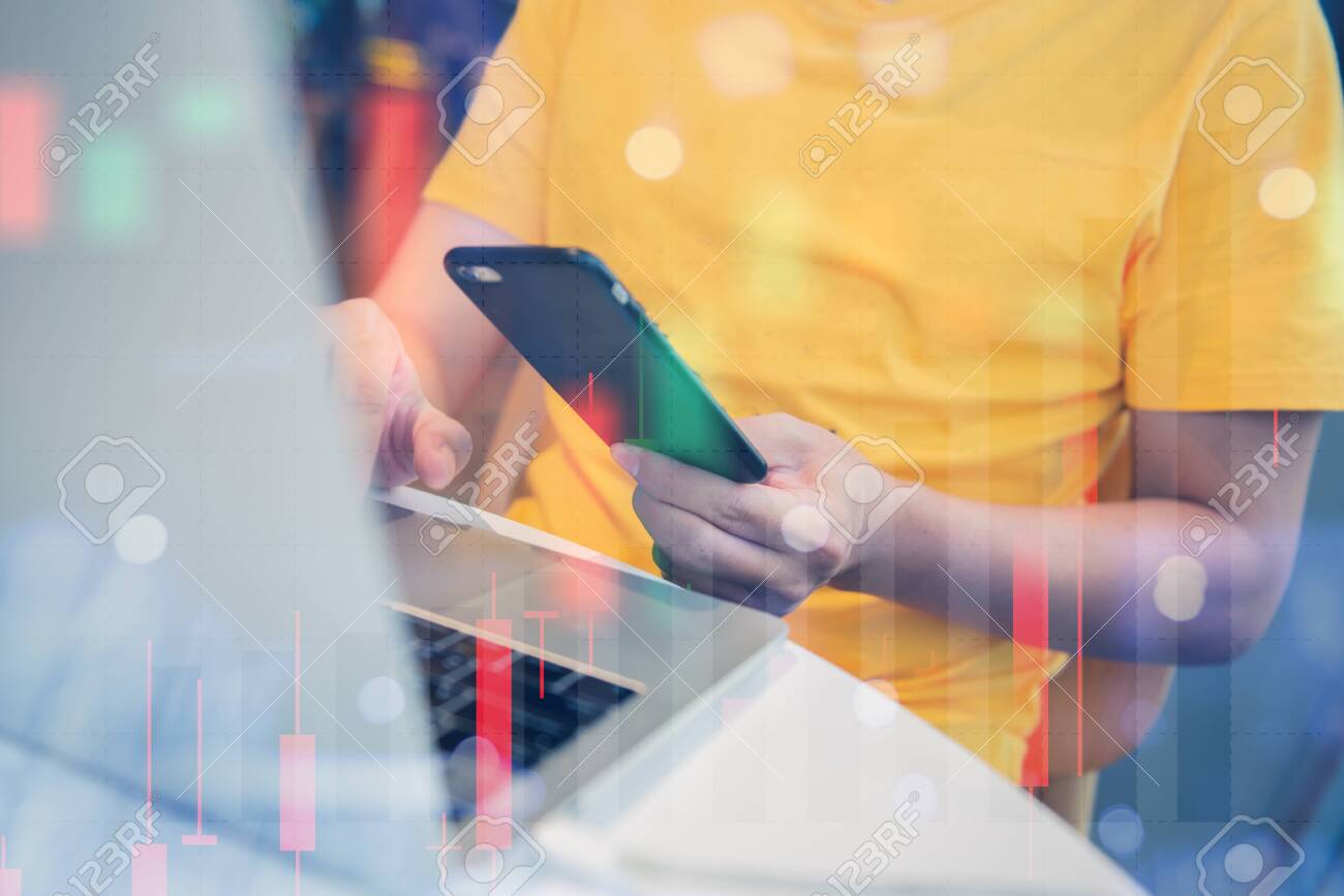Man with Laptop with trader analysis in world business and investment in stock market - 149693761 Man with Laptop with trader analysis in world business and investment in stock market - 149693761