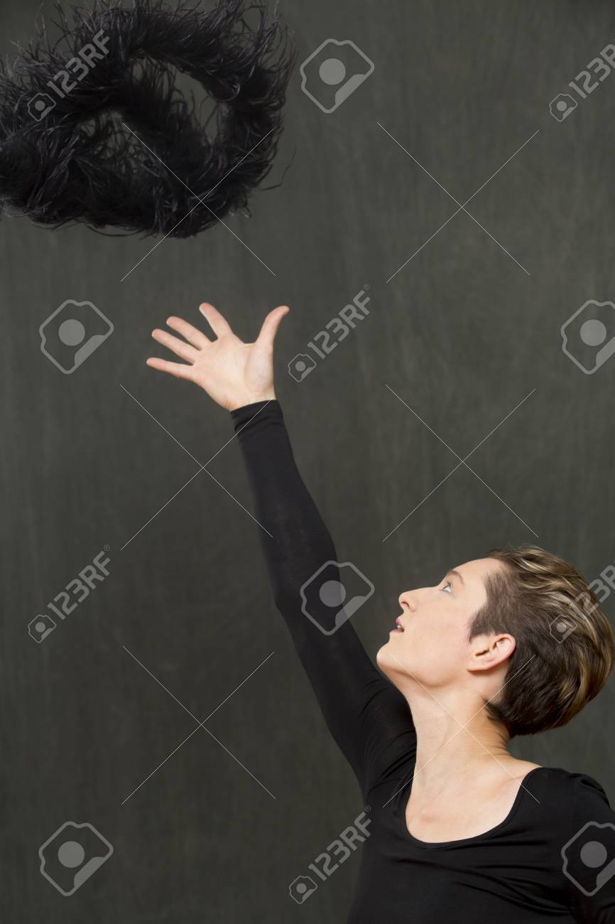 Attractive Young Woman Dancer With Short Hair In A Scoop Neck