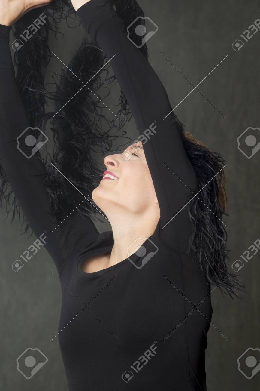 Attractive Young Woman Dancer With Short Hair In A Scoop Neck