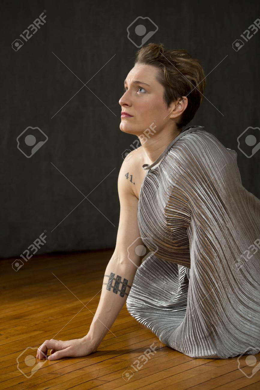Contemporary Young Woman Dancer With Short Hair In A Classical