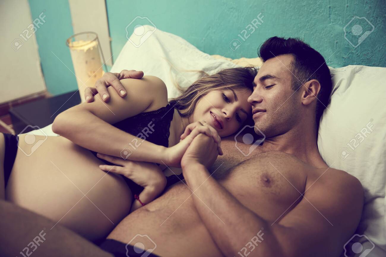 Couple In The Privacy Of Their Room, Having Sex On Bed Stock Photo, Picture  and Royalty Free Image. Image 153322052.