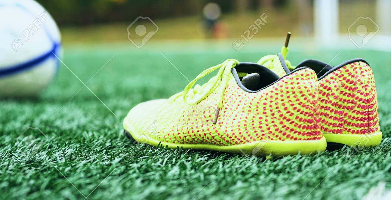 football boots on grass