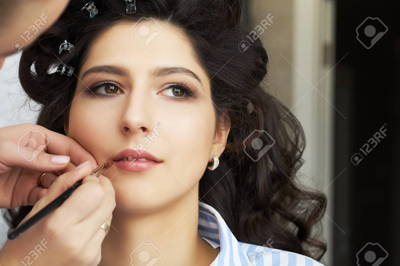The Make Up Artist Doing A Makeup For Bride Makeup Artist Applies