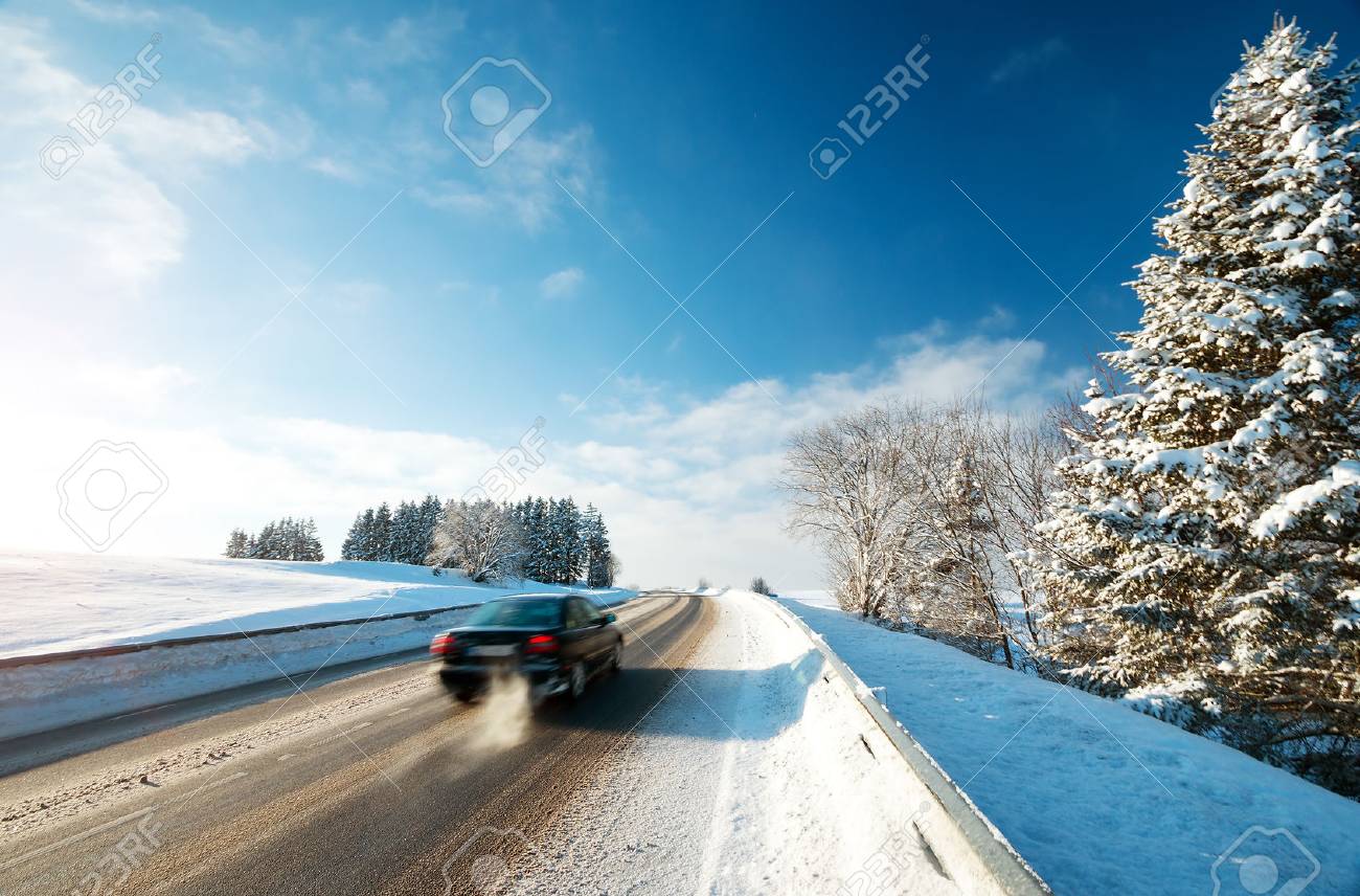 Car tires on winter road covered with snow - 66129480 Car tires on winter road covered with snow - 66129480