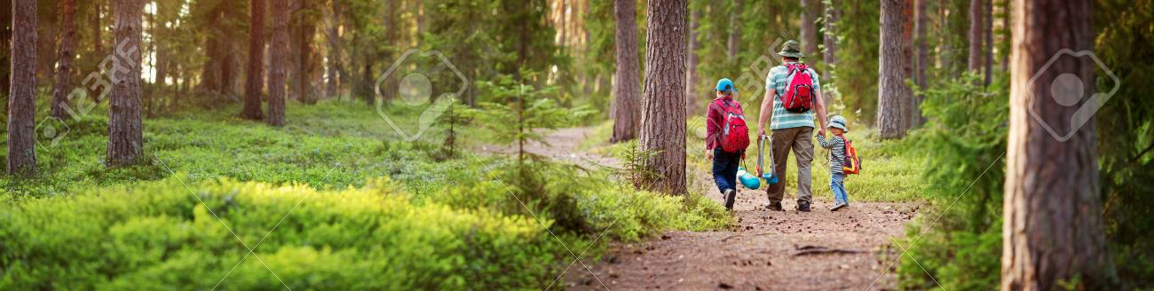 Father and boys going camping with tent in nature - 101581877 Father and boys going camping with tent in nature - 101581877