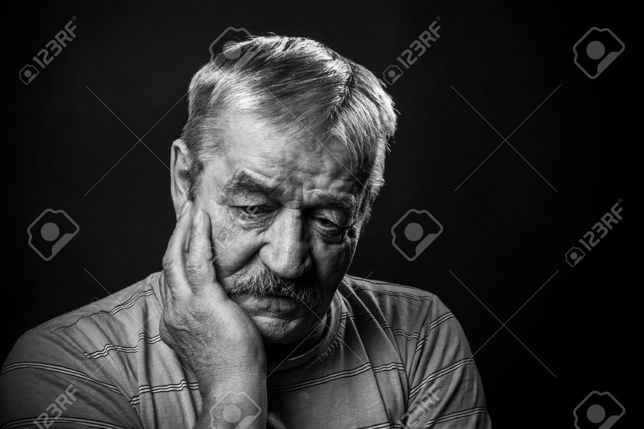very sad old man stock photo picture and royalty free image image