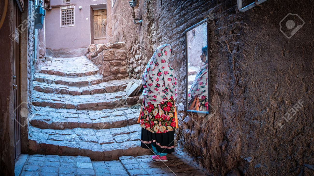 Abyaneh, Iran - May 2019: Unidentified Iranian woman with traditional Abyaneh Persian dress - 164356042 Abyaneh, Iran - May 2019: Unidentified Iranian woman with traditional Abyaneh Persian dress - 164356042